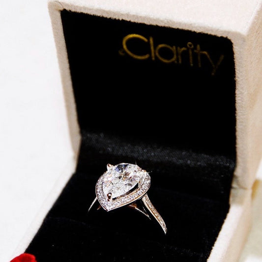 Fancy Pear-Shaped Diamond Ring with Pave Diamonds in 18k White Gold