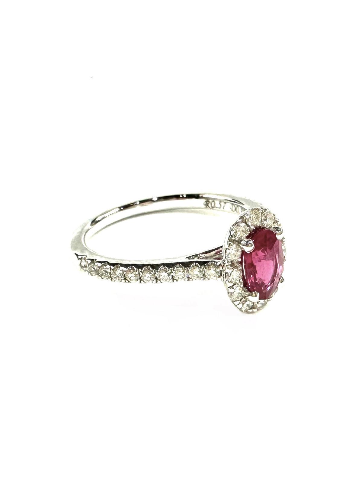 Oval Ruby Halo Diamond Ring